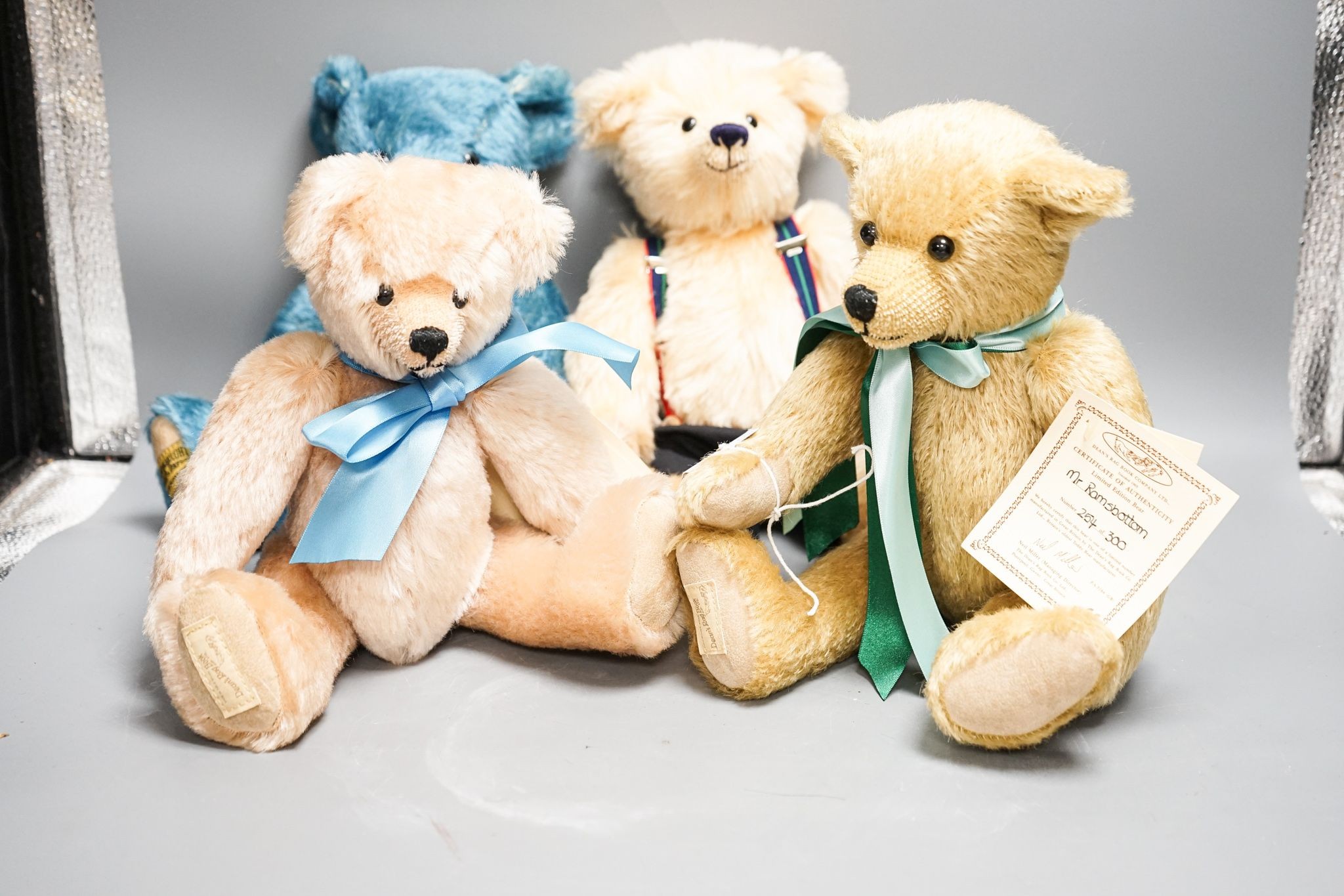 Four Deans Bears with certificates and one Merrythought